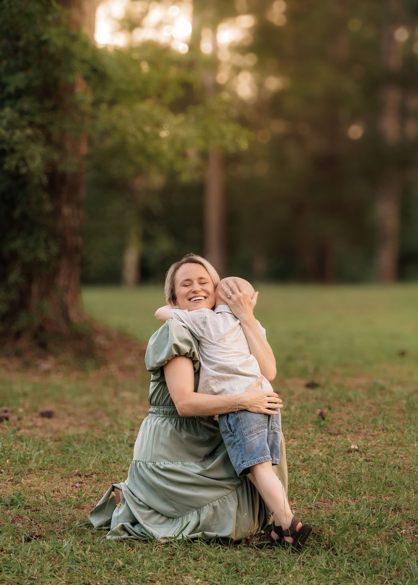mom and son hugging in the park